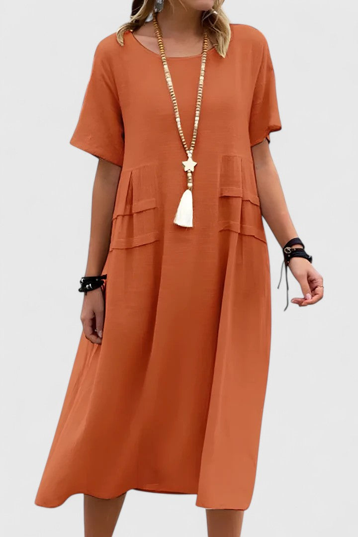 Elegant midi dress in refined feminine silhouette with flattering length designed to slim and elongate