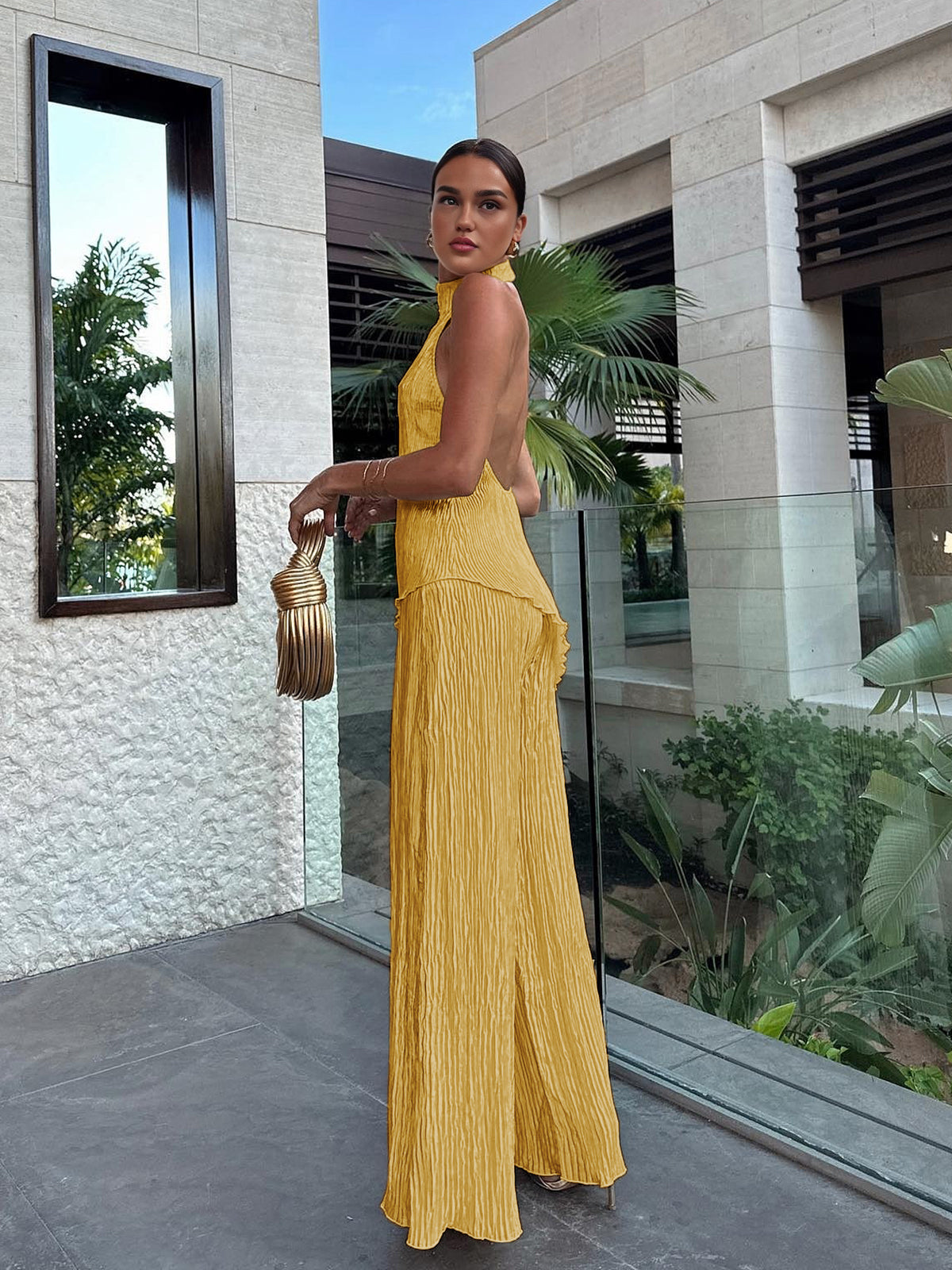 Women's ivory halter neck pleated top and wide leg pants co-ord set with resort-chic style