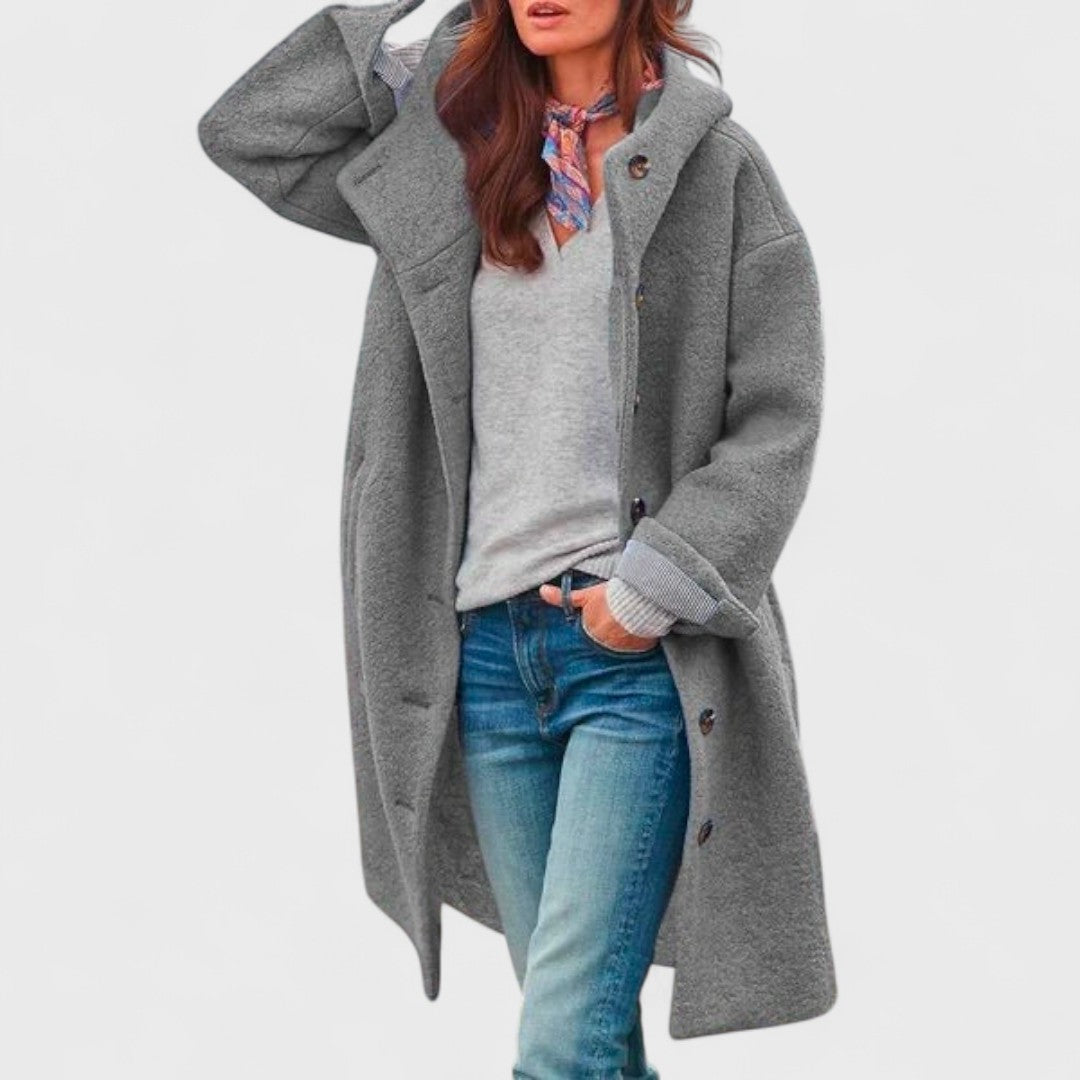 Sleek black city jacket with flattering fitted cut and polished minimalist design for cold weather
