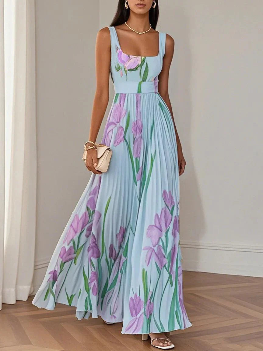 White pleated floral chiffon maxi dress with square neckline and flowing A-line silhouette
