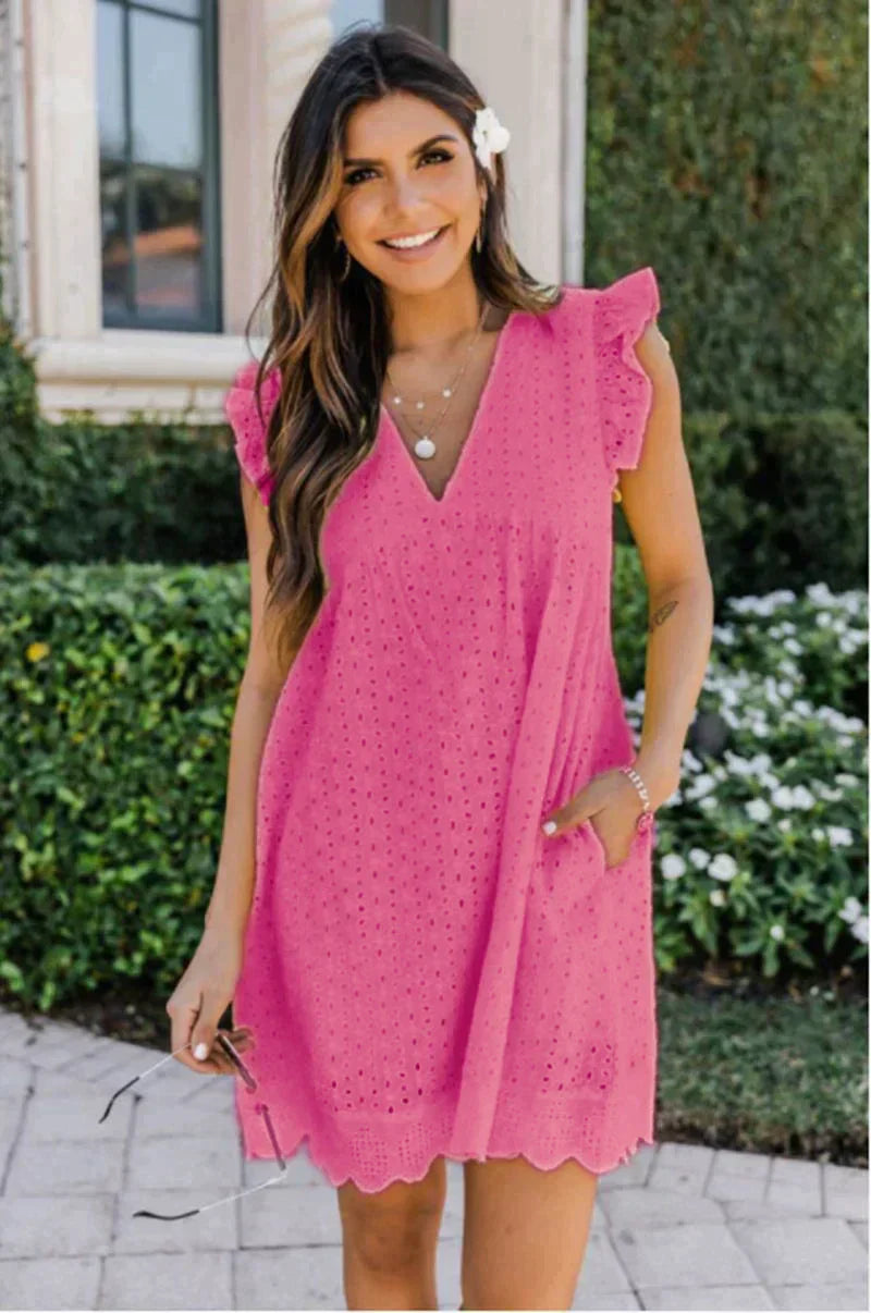 Women's white sleeveless summer V-neck dress with broderie anglaise detailing, lightweight cotton blend