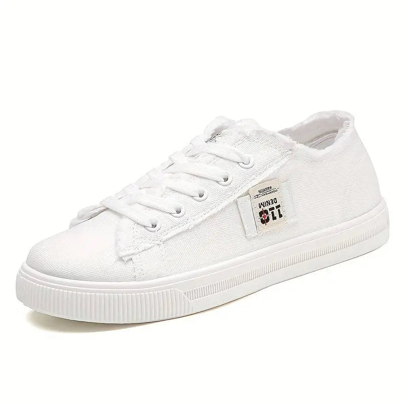 Victoria canvas sneakers in denim blue with frayed vintage edges for casual everyday wear