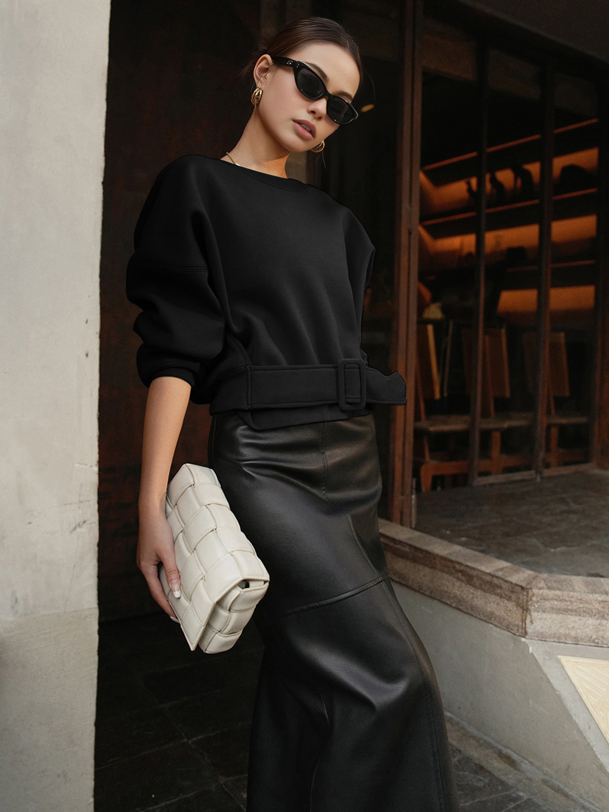 Cropped gray sweatshirt with waist belt detail, relaxed fit cotton-poly blend casual top