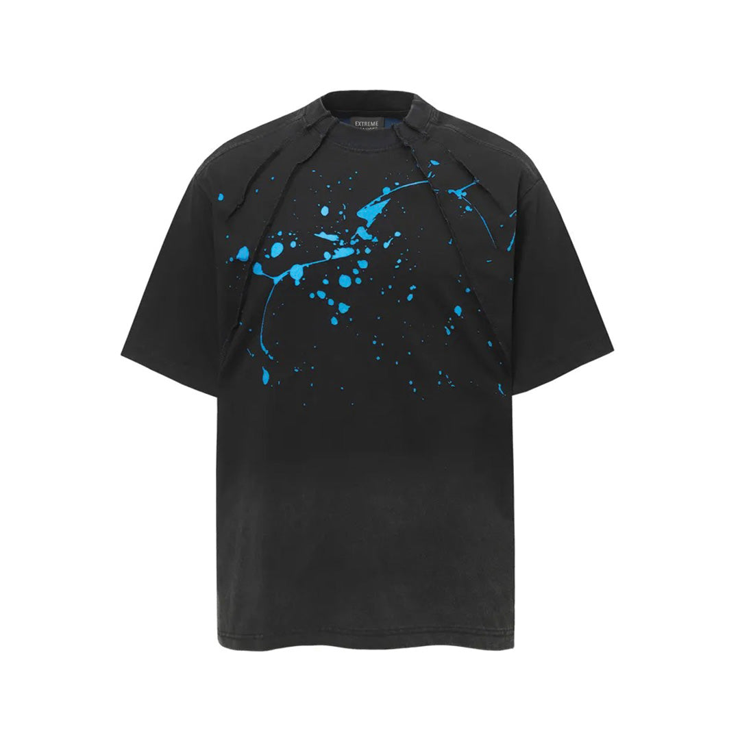 White loose fit cotton t-shirt with hand-printed paint splatter graphic and jagged seam construction