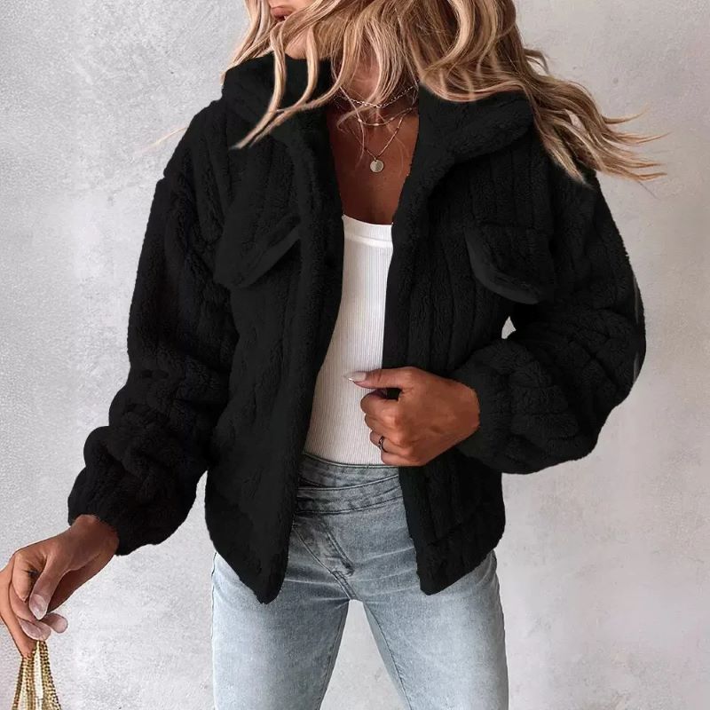 Cropped ivory faux fur trucker jacket with ribbed knit texture, wide turn-down collar and cinched cuffs