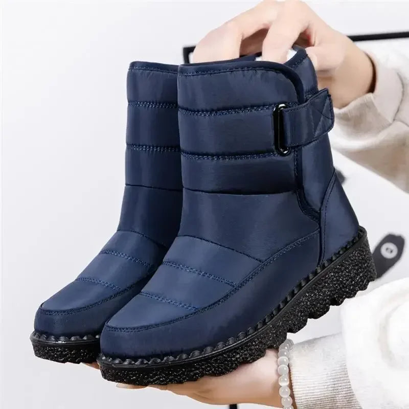 Women's black waterproof boots sleek ankle silhouette with smooth contours for all-weather style