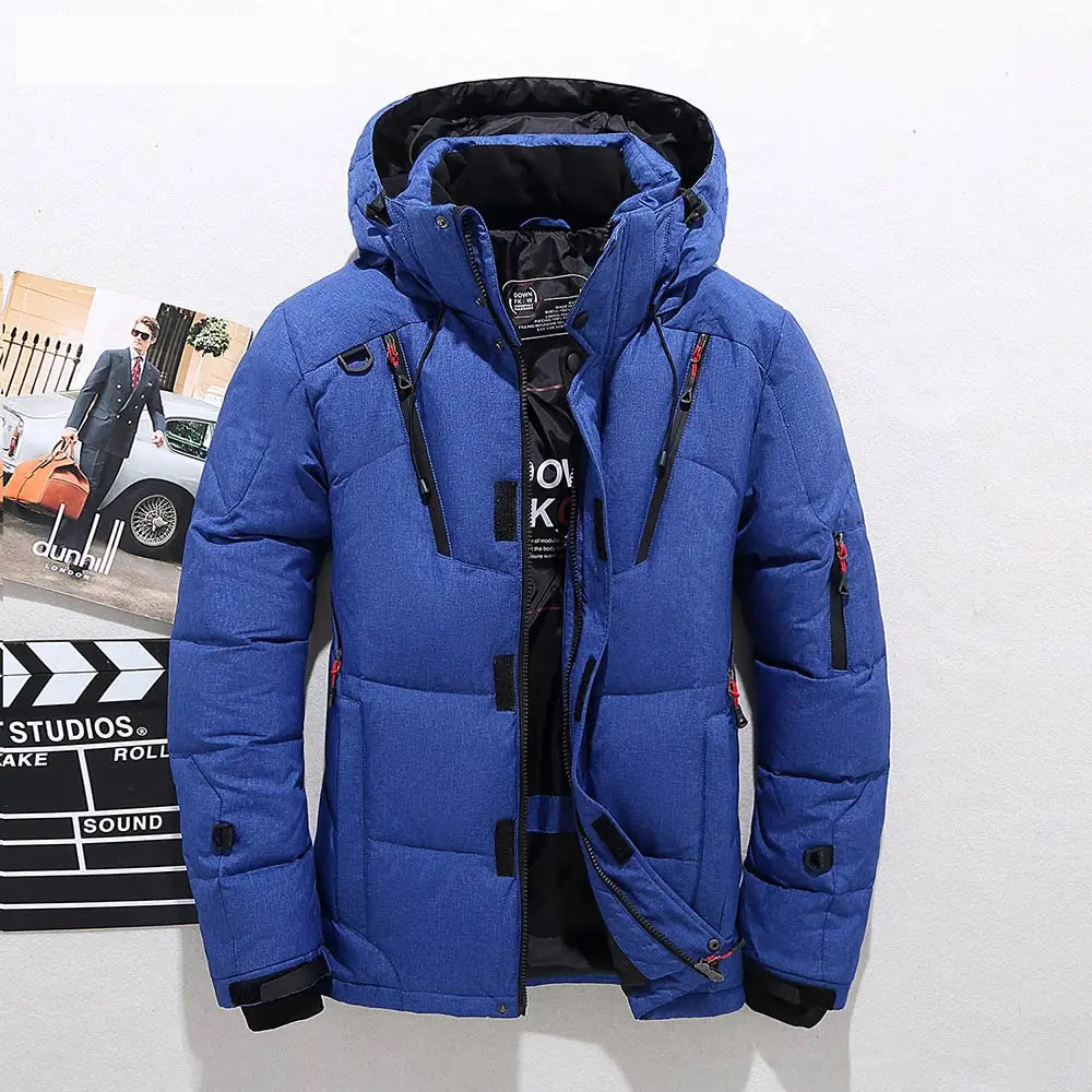 Men's navy blue puffer jacket with detachable hood and storm flap, clean winter silhouette