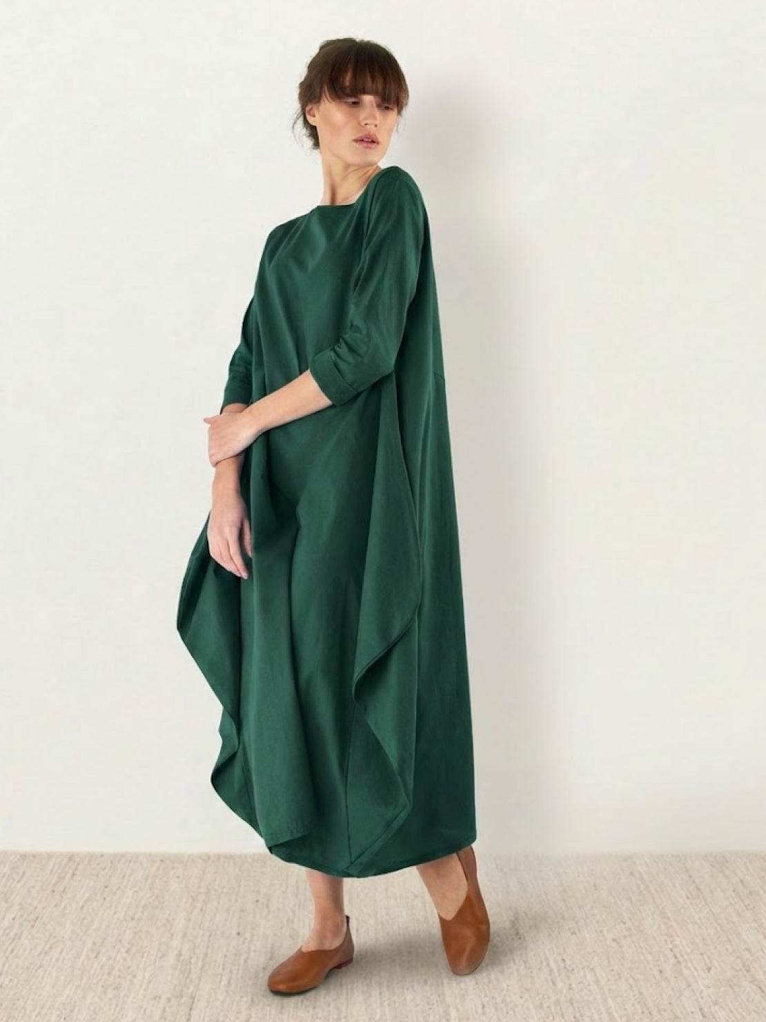 Women's ivory oversized boho maxi dress with 3/4 batwing sleeves and flowing floor-length silhouette
