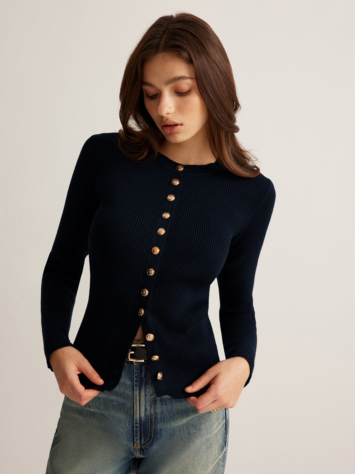 Slim fit skinny knit top with button-down front detail in elegant polyester fabric