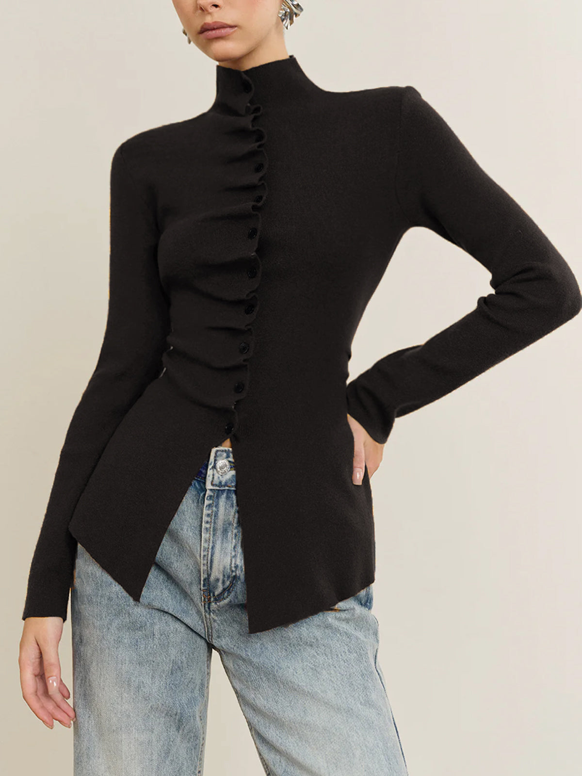 Casual knit long sleeve top with button placket, pleated detail and side split hem