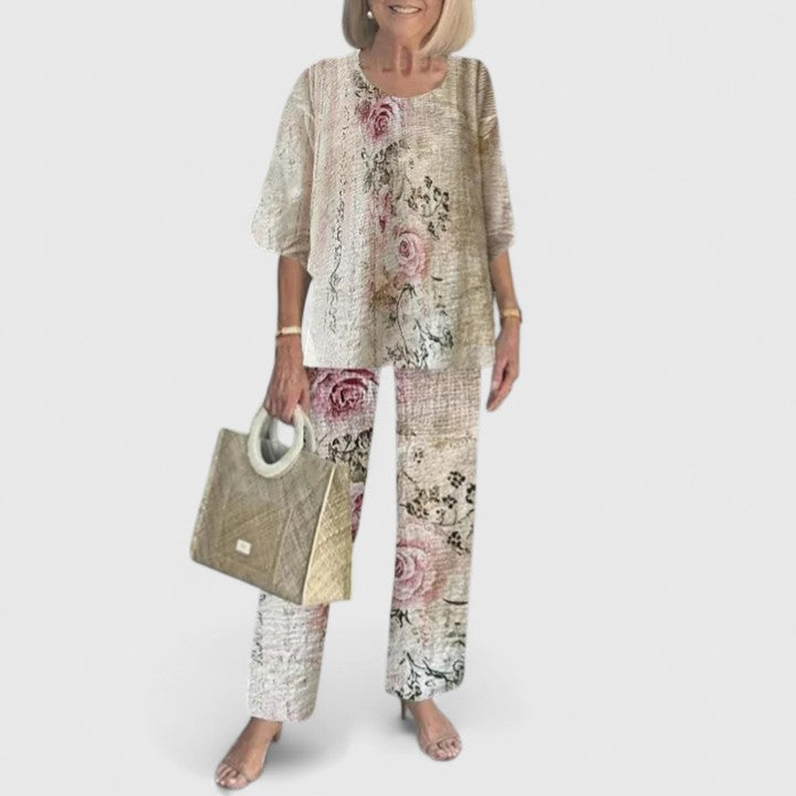 Sage green floral two-piece set with relaxed layered top and botanical print wide-leg pants