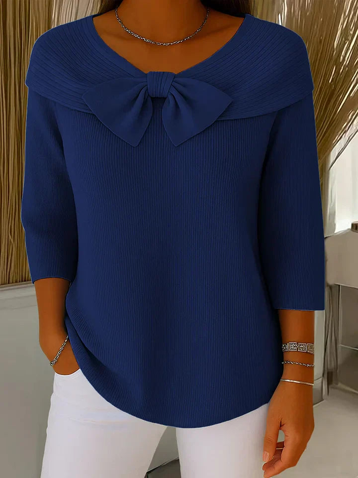 Soft feminine sweater with delicate bow accent, lightweight breathable knit in violet-inspired chic style