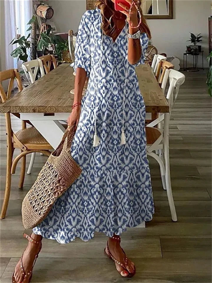 Floral maxi dress with tassel-tie V-neck boho silhouette, lightweight breezy fabric for summer