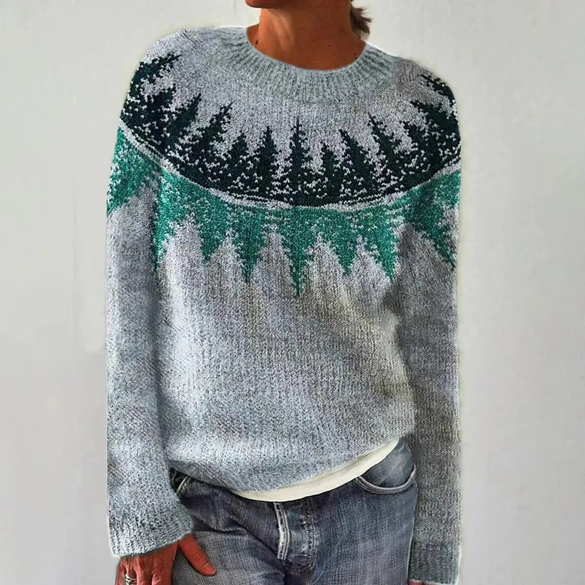 Elegant relaxed-fit Nordic-pattern sweater in warm tones, cozy cold-weather statement piece