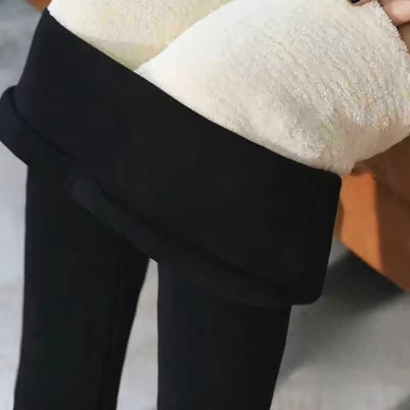 Women's black high-waisted thermal leggings sherpa fleece lined tummy control winter running