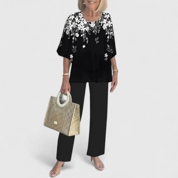 Sage green floral print two-piece set with relaxed layered top and wide-leg pants for women