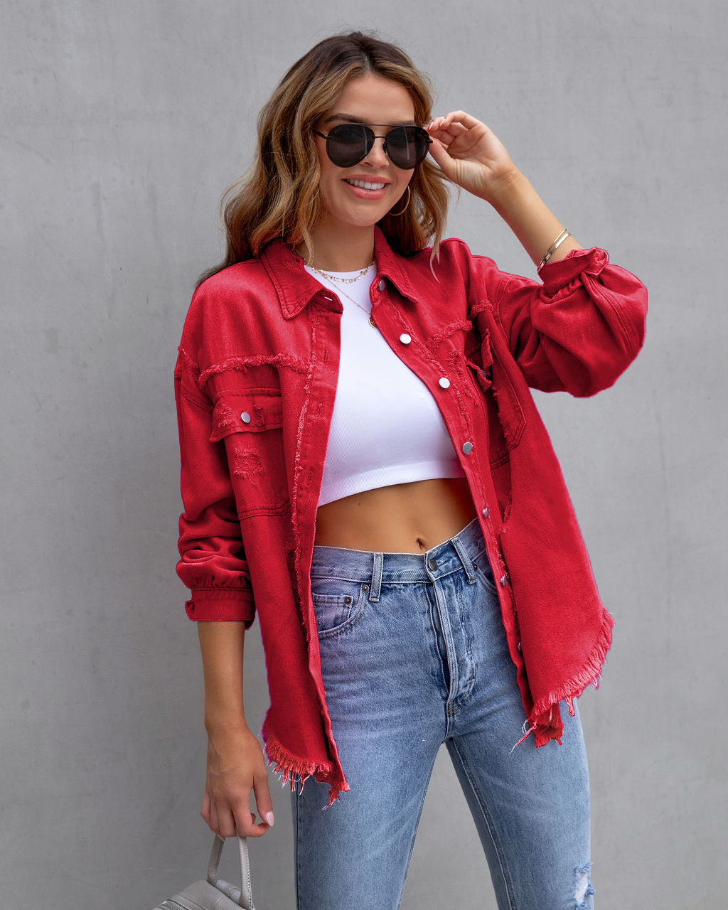 Women's oversized beige shirt jacket with relaxed urban fit and distressed detailing by Wavlynn