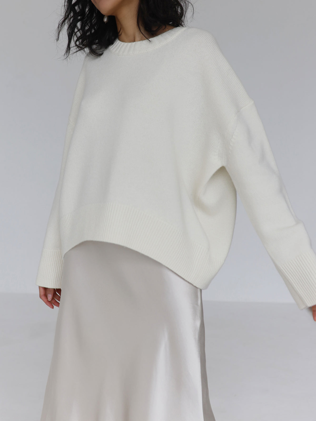 Candyfloss pink oversized pullover knit sweater with relaxed shift fit and casual style