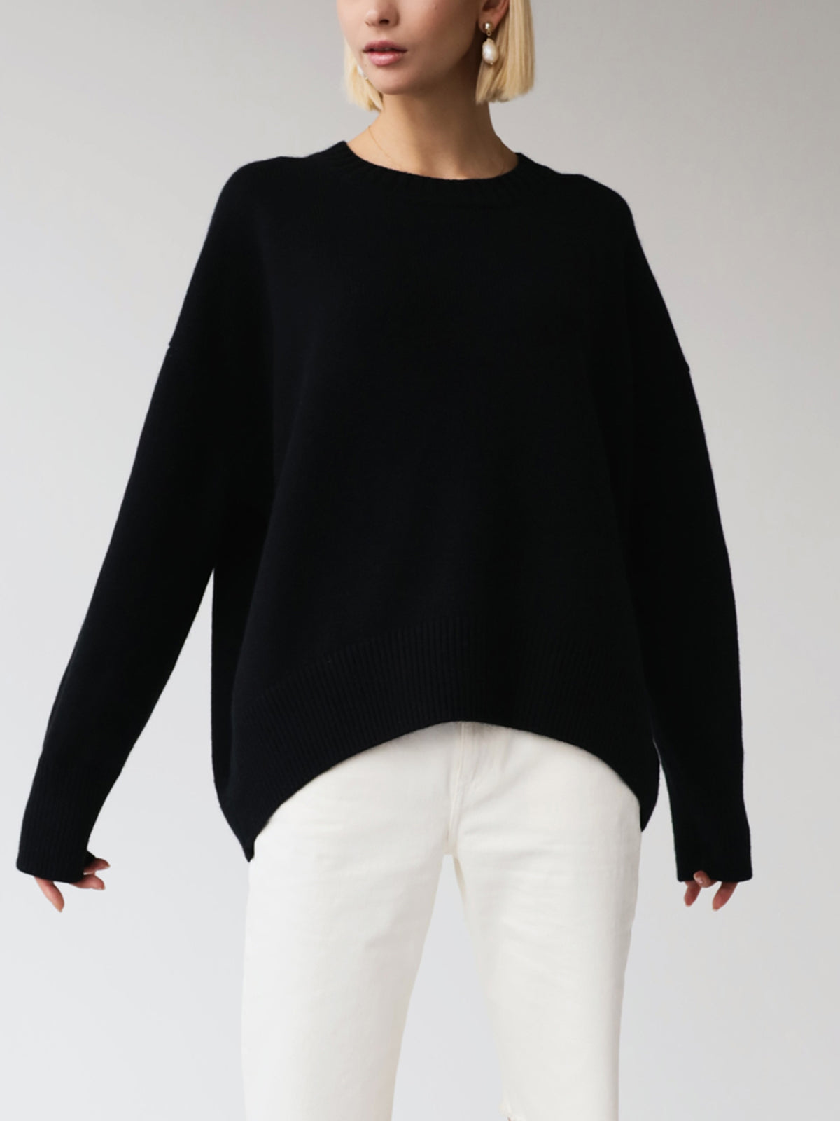 Candyfloss pink oversized pullover knit sweater with relaxed shift fit and medium stretch