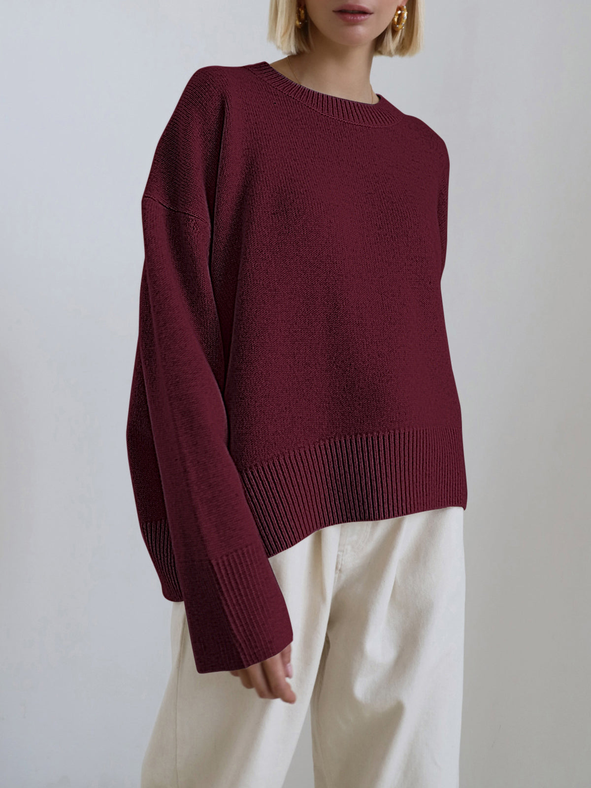 Candyfloss pink oversized pullover knit sweater with relaxed shift fit and medium stretch
