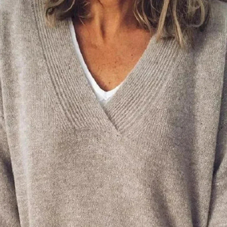 Women's relaxed fit cashmere V-neck pullover in cozy knit fabric, perfect layering essential