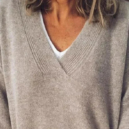 Women's relaxed fit cashmere V-neck pullover in cozy knit fabric, perfect layering essential