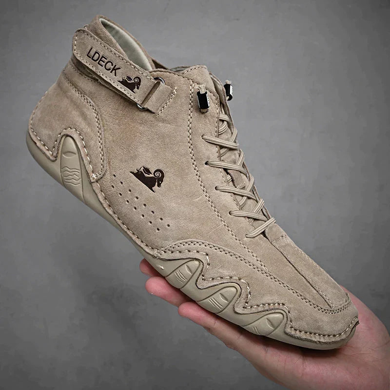 Men's brown leather lace-up ankle boots with moc toe silhouette and non-slip sole