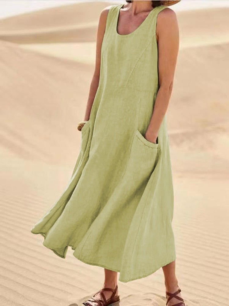 Breezy knee-length summer dress in lightweight cotton-poly blend, flattering silhouette for hot days