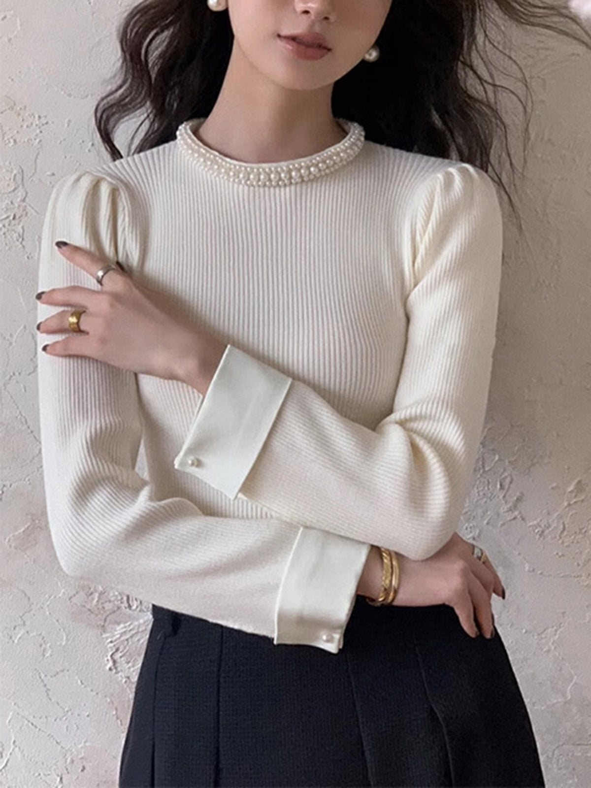 Slim fit elegant knit sweater with contrast trim binding and pearl details, versatile style