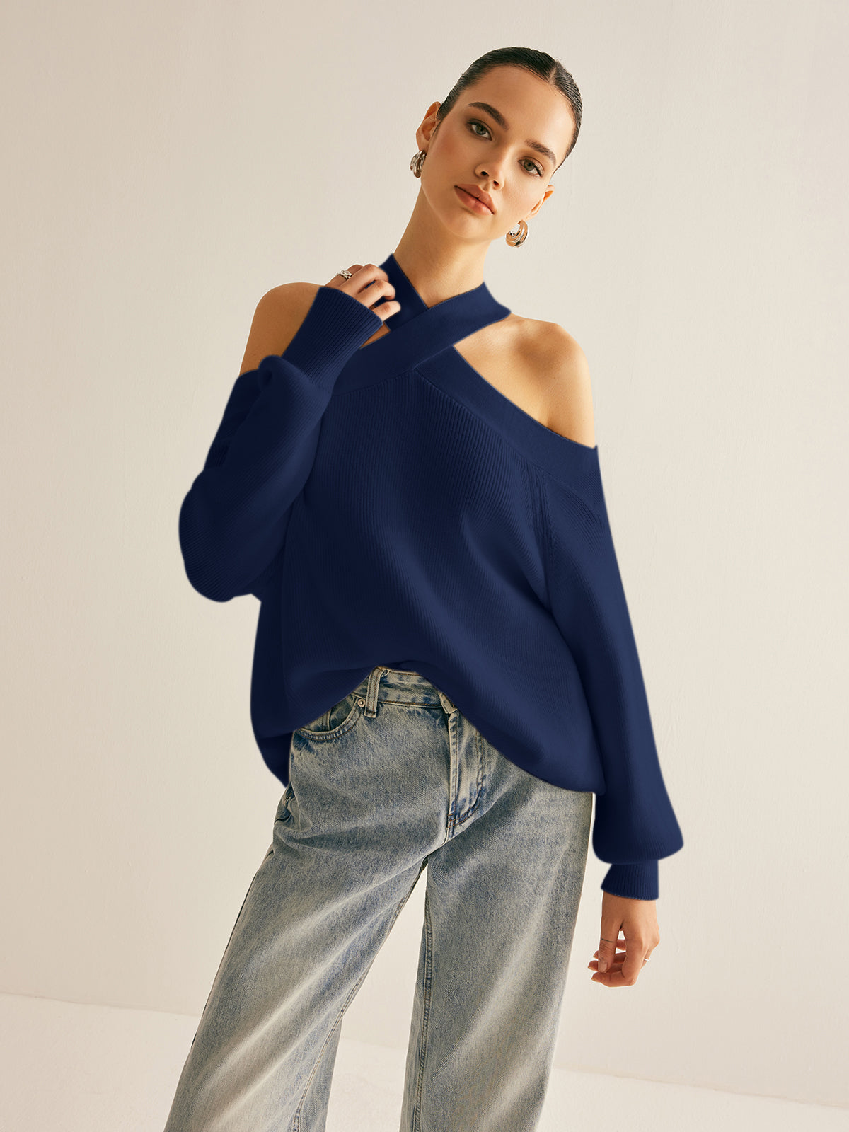 Ivory knit cold-shoulder sweater with crossover collar, casual elegant halter style, high stretch fit