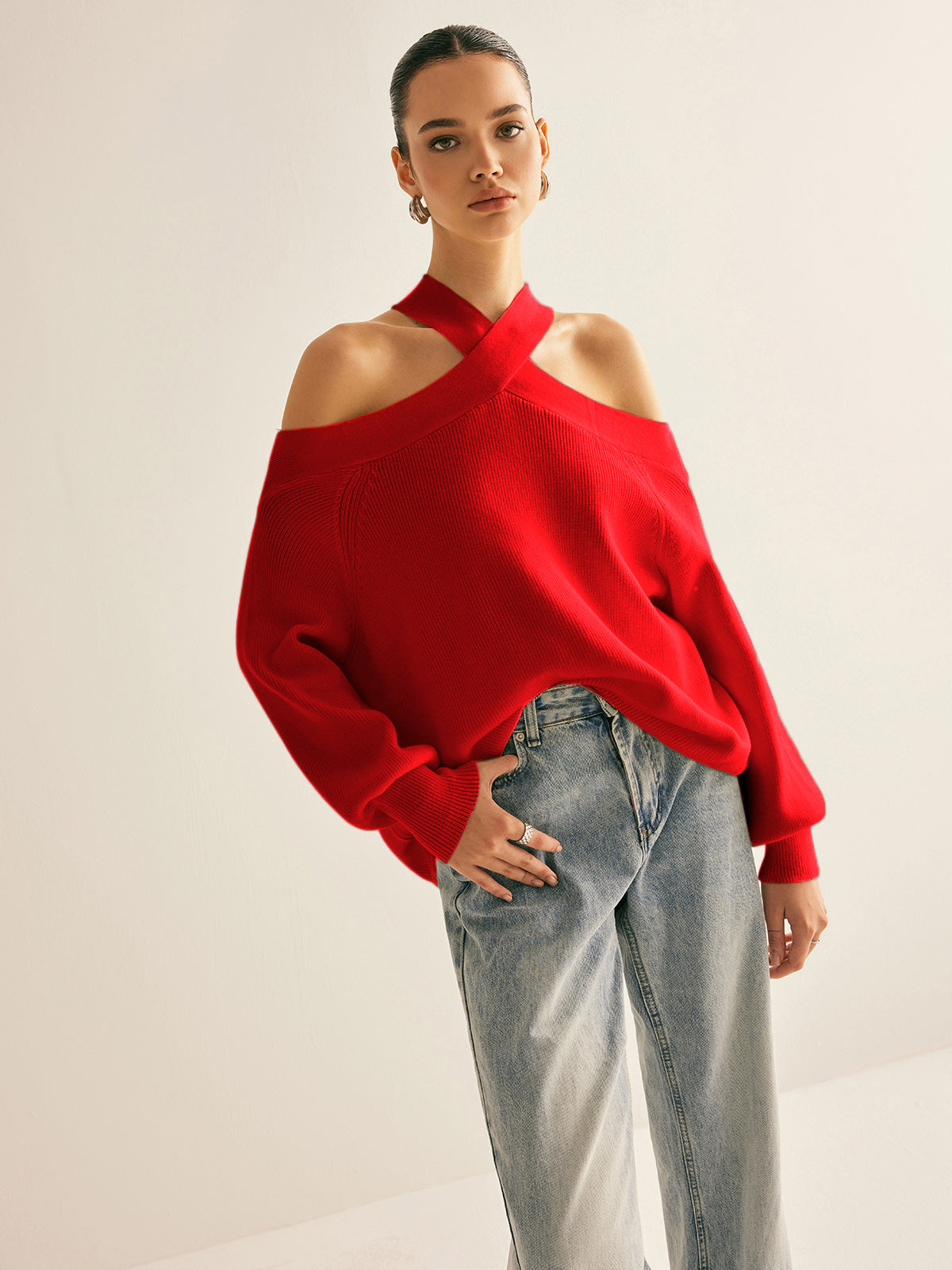 Ivory knit cold-shoulder sweater with crossover collar, casual elegant halter style, high stretch fit