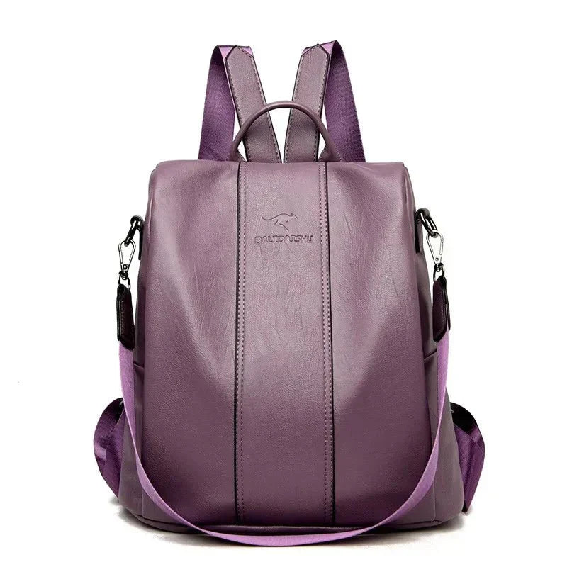 Black vegan leather convertible backpack handbag with top handle, shoulder and crossbody straps