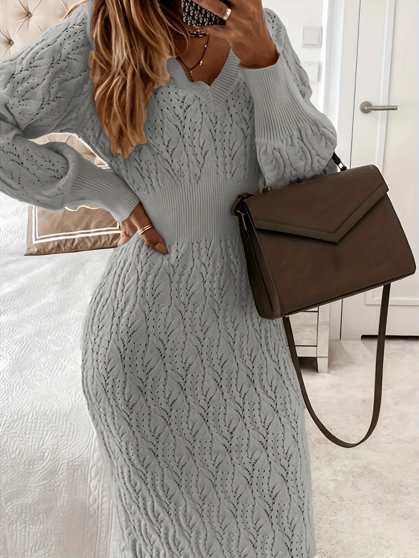 Women's fitted ribbed knit dress in elegant V-neck long-sleeve style with curve-hugging silhouette