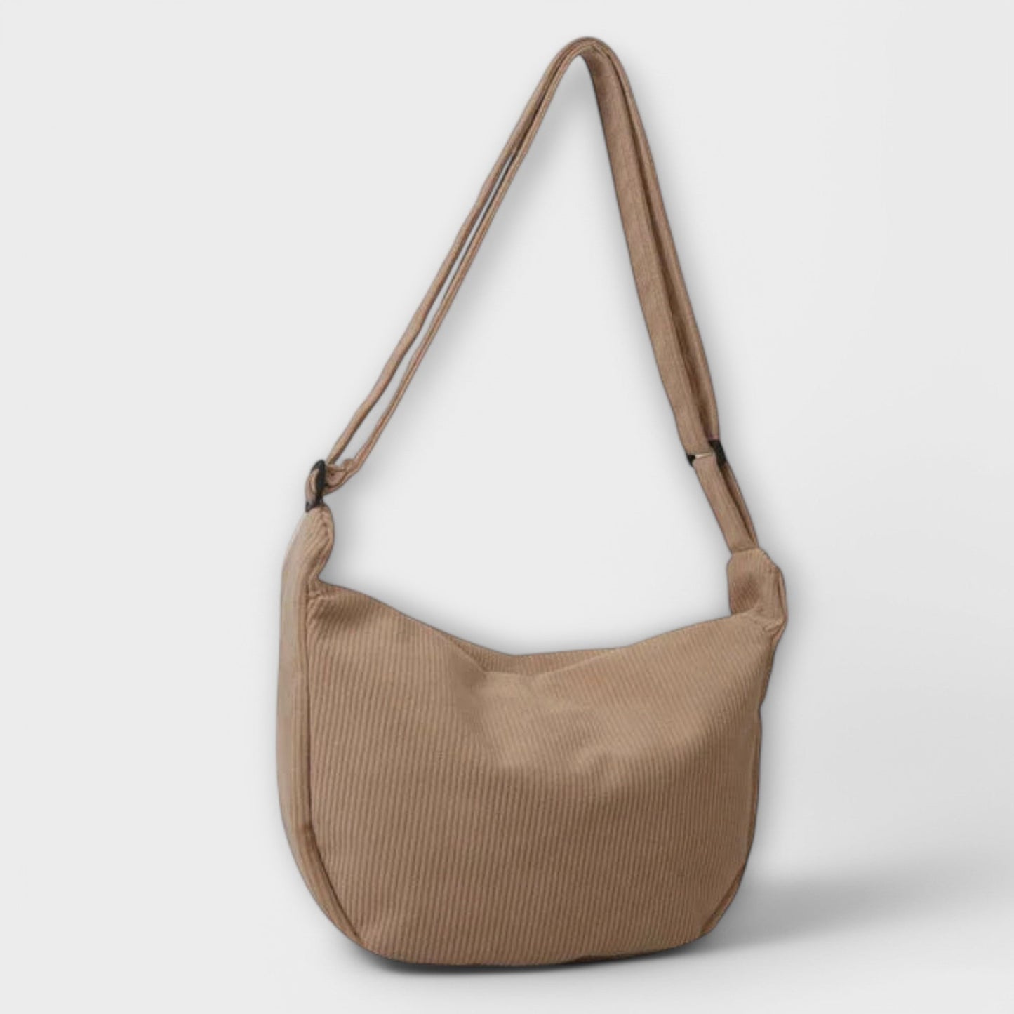 Ingrida structured shoulder bag in elegant silhouette with soft shape and refined strap detail