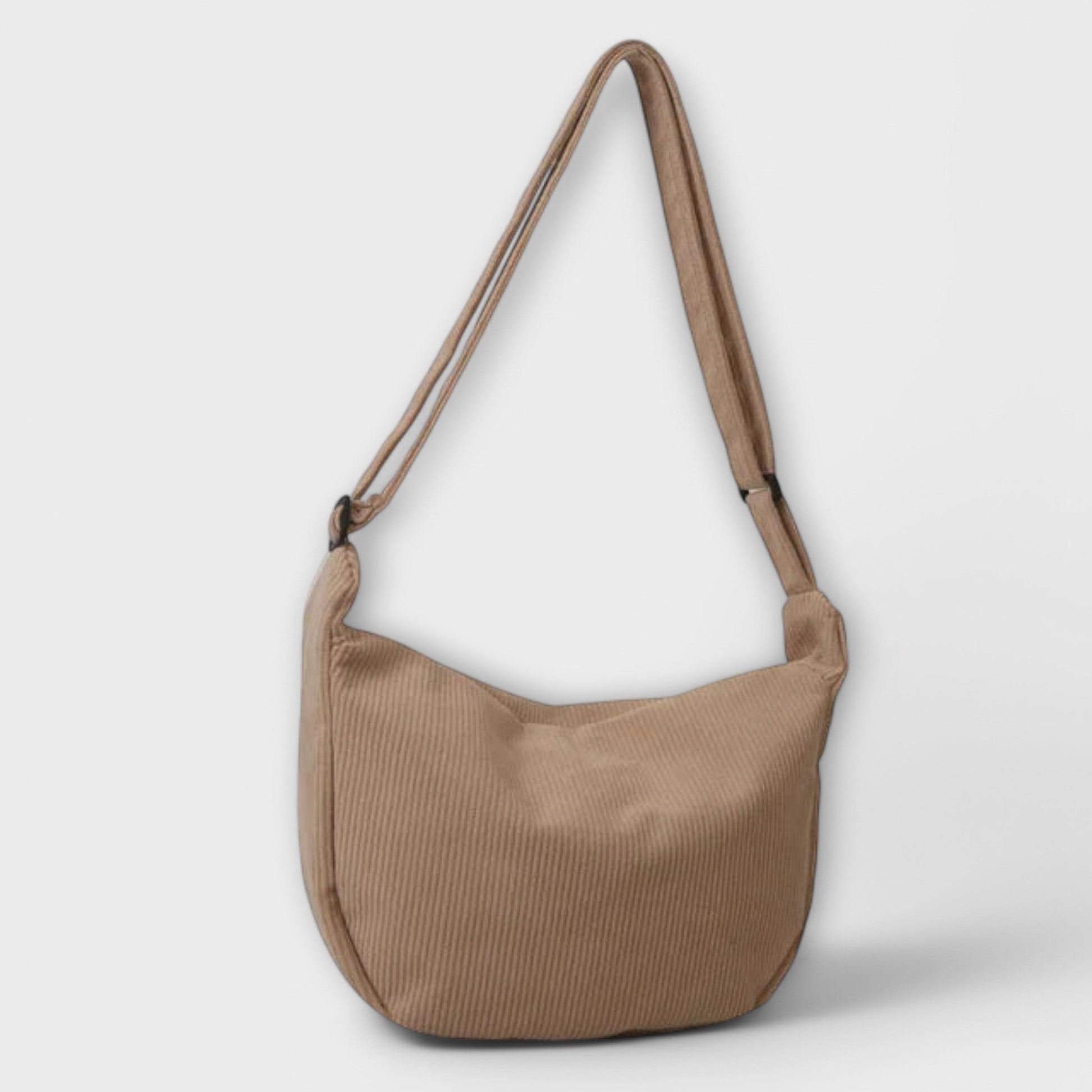 Ingrida structured shoulder bag in elegant silhouette with soft shape and refined strap detail