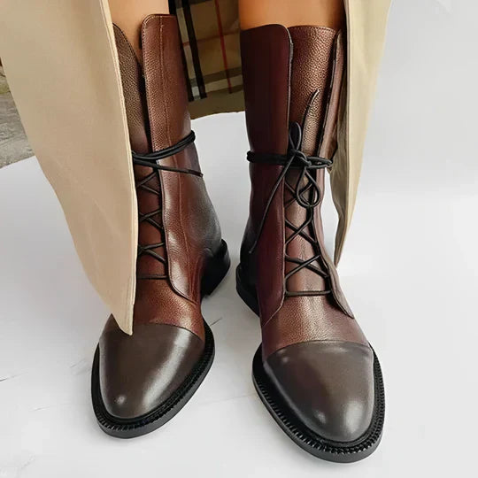 Women's black PU leather lace-up ankle boots with sleek cap-toe silhouette and low profile