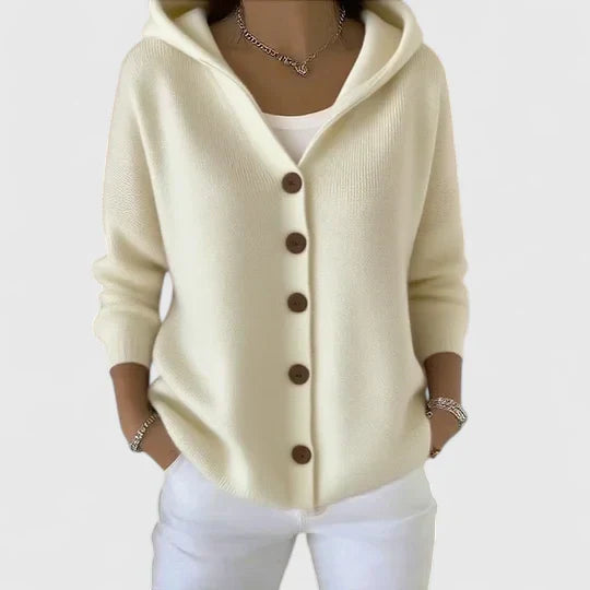 Elegant cream knit cardigan with refined drape and flattering relaxed fit for effortless layering