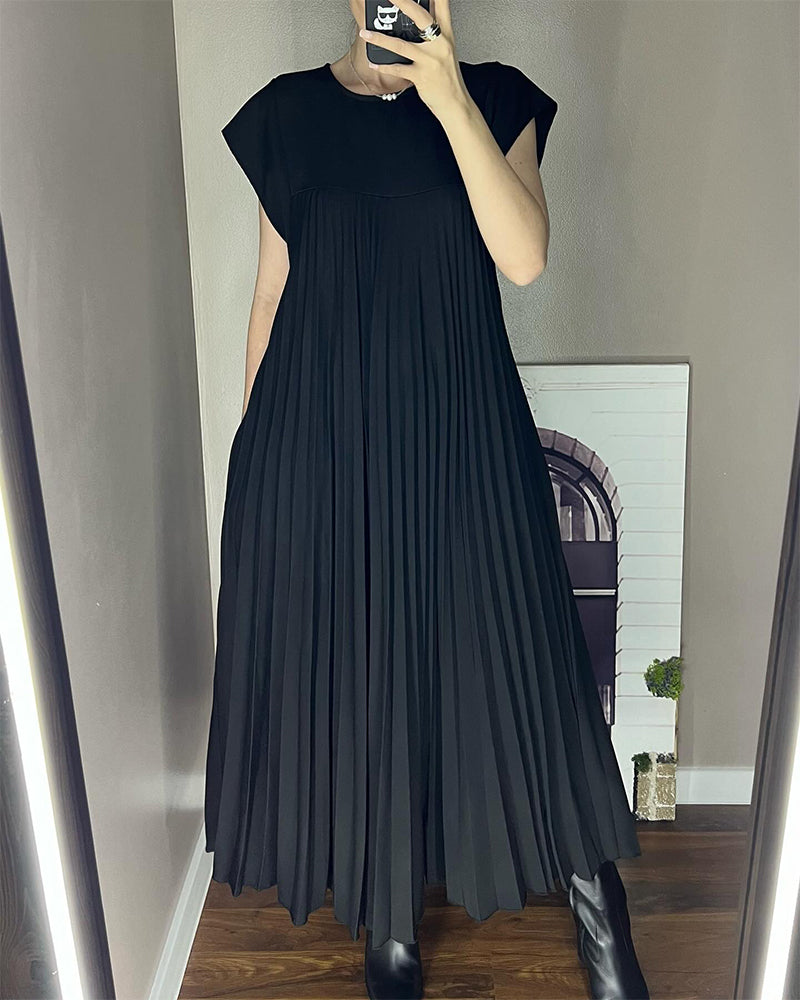 Emerald green women's flowy pleated maxi cocktail dress with elegant draped silhouette