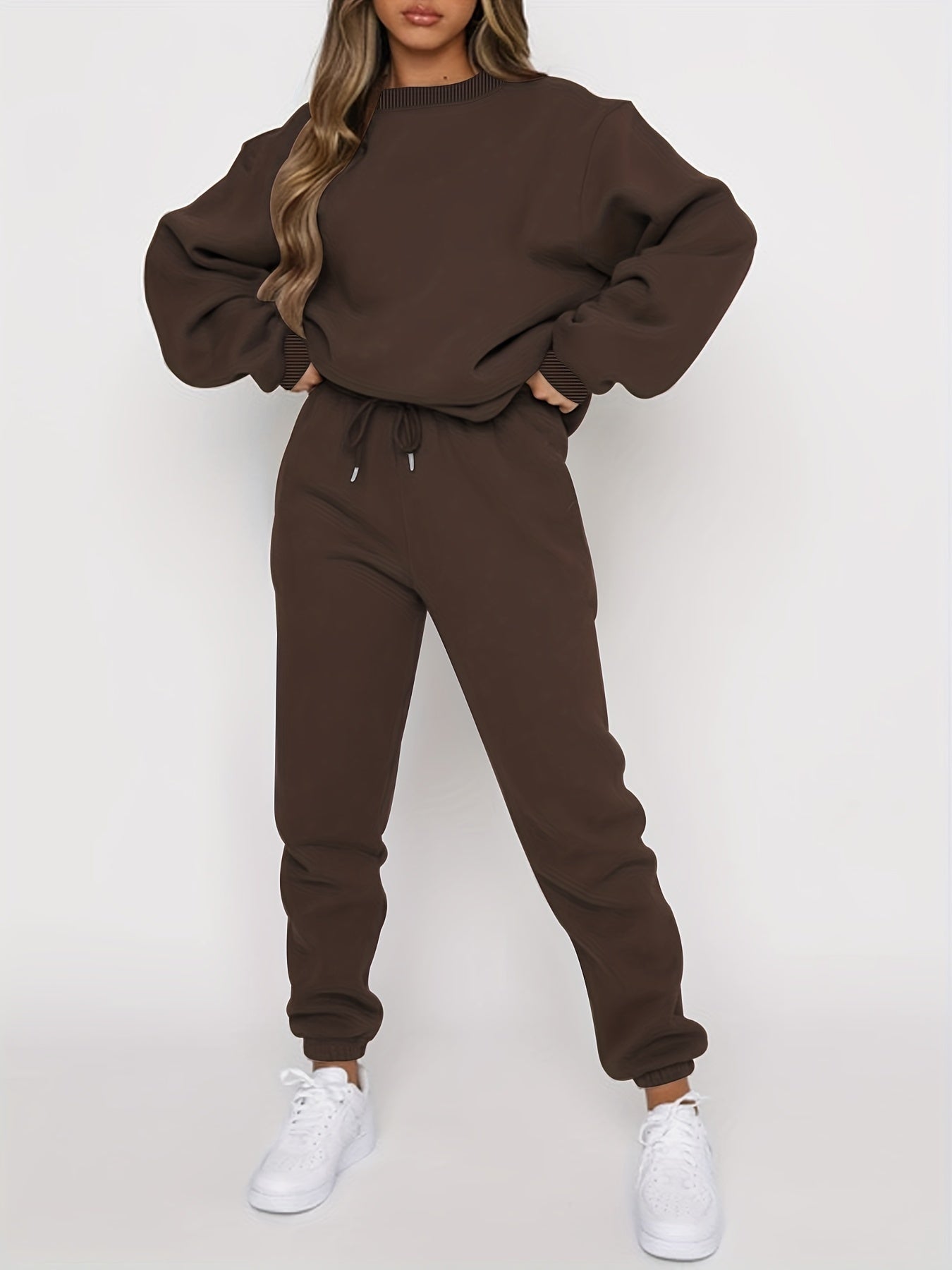 Women's gray oversized sweatshirt and high-waisted joggers matching lounge set