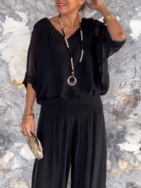 Olive green women's 2-piece batwing sleeve V-neck jumpsuit with sheer top and wide-leg pleated pants