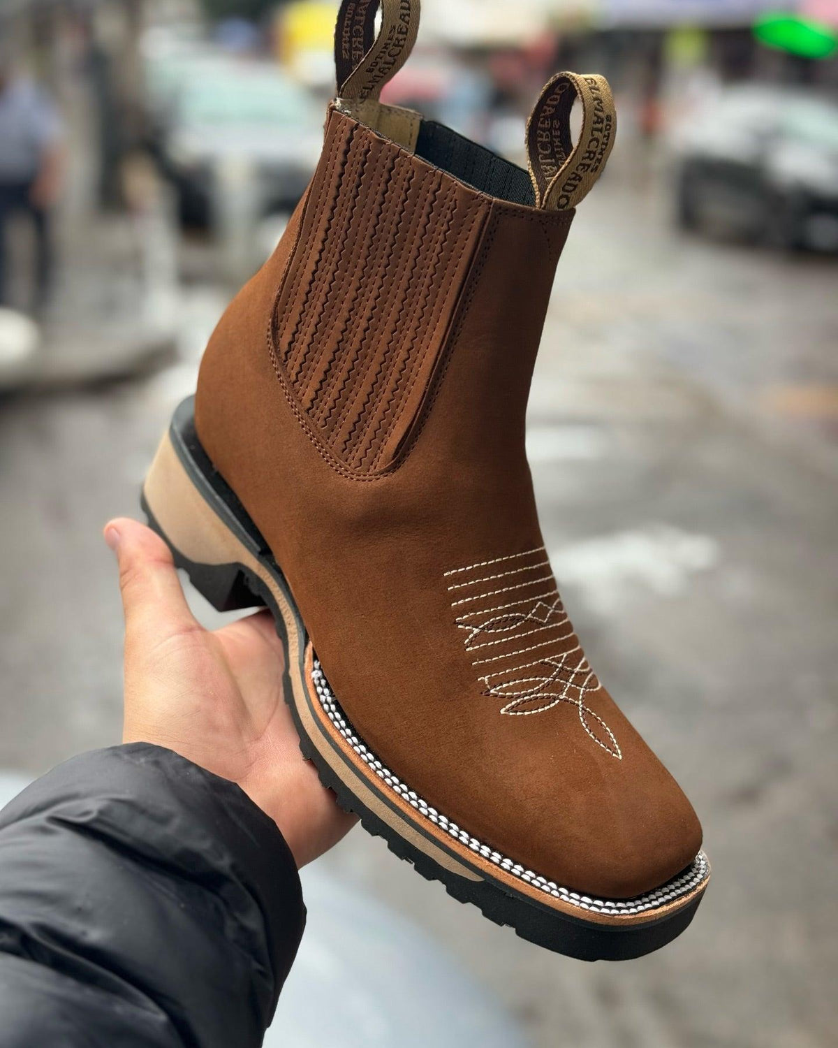 Haven brown leather cowboy boots with classic Western stitching and ergonomic support sole