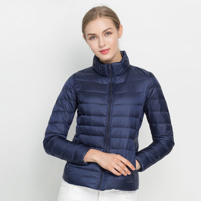 Women's slim fit lightweight puffer winter coat sleek silhouette insulated padding everyday warmth