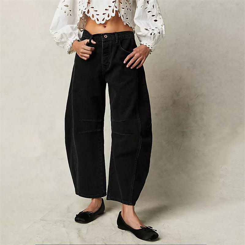 Women's high waist barrel leg jeans relaxed fit light acid-wash denim sculptural silhouette