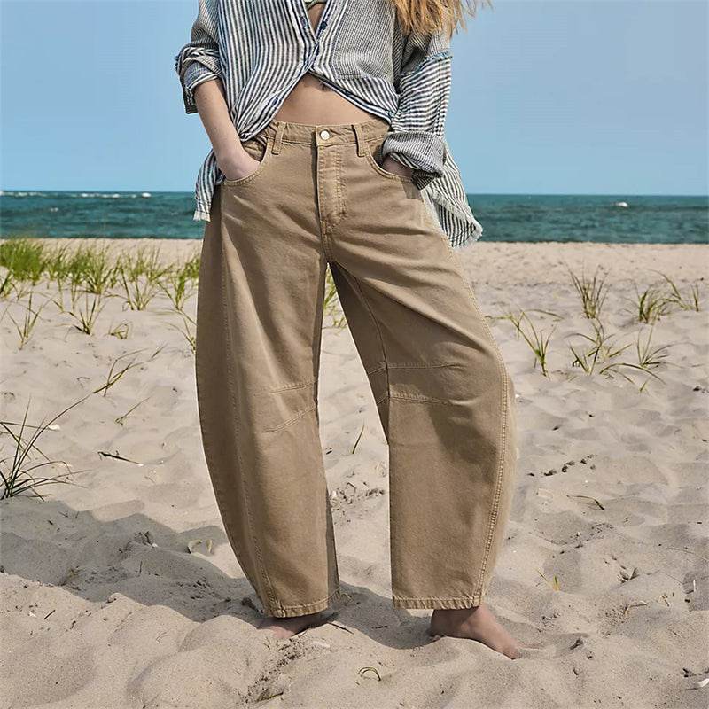 Women's high waist barrel leg jeans relaxed fit light acid-wash denim sculptural silhouette