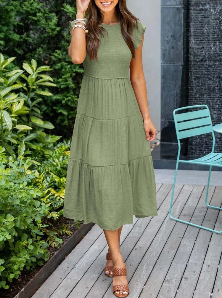 Women's elegant draped tummy control dress with flattering front gathering for a slimming silhouette