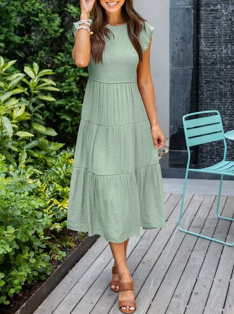 Women's elegant draped tummy control dress with slimming front gathering for a confident silhouette