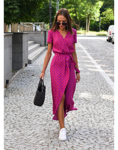 Women's polka dot maxi wrap dress with short sleeves and adjustable waist in classic spring style