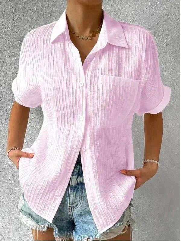 Women's relaxed fit short-sleeve shirt with button closure, lightweight breathable fabric and chest pocket