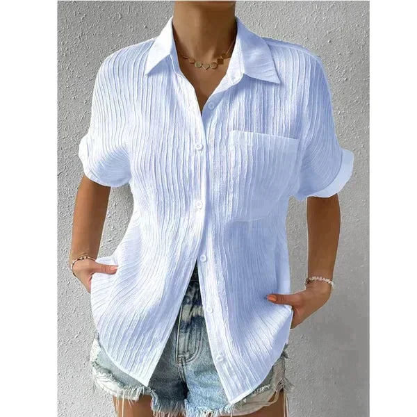 Women's relaxed fit short-sleeve shirt with button closure, lightweight breathable fabric and chest pocket
