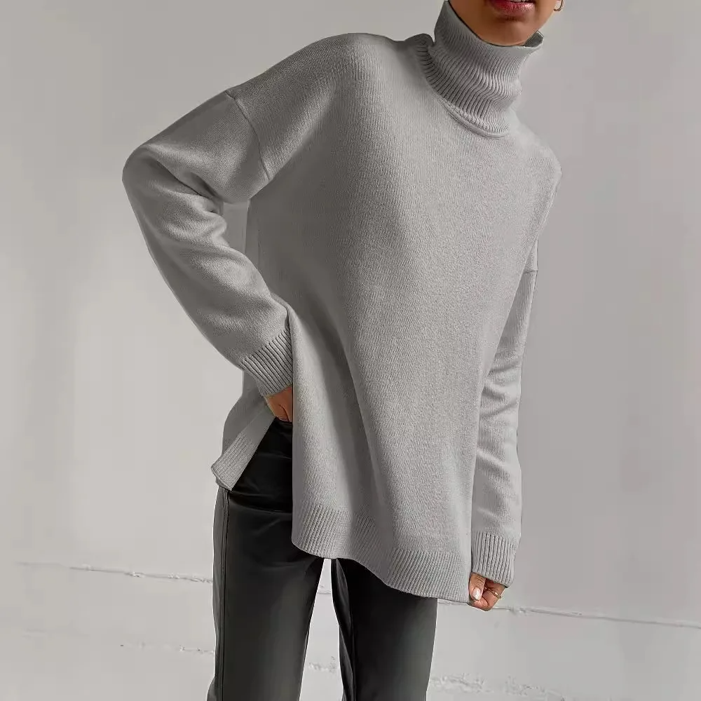 Women's cream oversized turtleneck sweater, fine gauge knit tunic length with ribbed cuffs
